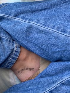 a person's foot with a tattoo on the ankle that says be good to god