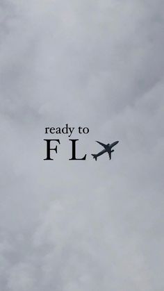 an airplane flying in the sky with words reading ready to fly