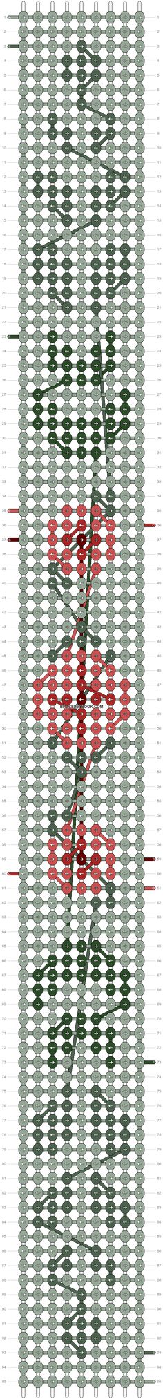 a cross stitch pattern with red and green lines