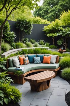 an outdoor seating area with wooden benches and plants on the sides, surrounded by greenery