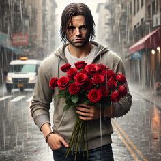 a man holding a bunch of red roses in the rain