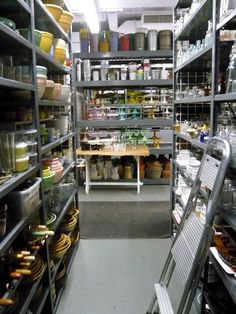 the shelves are filled with many different items