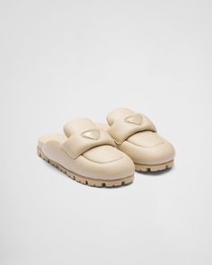 Desert Beige Soft padded nappa leather sabots | Prada Band Shoes, Prada Collection, Fancy Shoes, Triangle Logo, Cute Sandals, Swag Shoes, Slipper Sandals, Leather Slides, Slipper Shoes