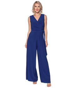 Jumpsuits are oh, so chic! Especially our Last Tango pantsuit jumper! This jumpsuit has a beautiful draped neckline with flowy pant legs, and of course the tie waist. The flowy pant legs make this jumpsuit extra chic. You can wear this to weddings, to parties, or other special occasions. Not to mention, this is one of our best selling pieces! DETAILS: Crossover Neckline, Tie Waistband, Sleeveless, Wide Leg Pant, Jumpsuit FIT: Relaxed, Flowy Fit SIZING: XS-S-M-L-XL FABRIC: 92% Polyester 8% Spande Chic Jumpsuits And Rompers With Tie Waist Maxi Length, Chic Blue Wide-leg Jumpsuits And Rompers, Chic Blue Wide Leg Jumpsuits And Rompers, Elegant Wide Leg Belted Jumpsuits And Rompers, Chic Blue Belted Jumpsuits And Rompers, Chic Wide Leg Jumpsuit With Tie Waist, Chic Wide Leg Jumpsuits And Rompers With Tie Waist, Elegant Jumpsuits And Rompers With Tie Waist, Elegant Sleeveless Tie Waist Jumpsuits And Rompers