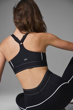 Ready for action. The medium-impact Airlift Suit Up Bra is so supportive for movement and perfect for pavement. Ultra-forward piping & adjustable straps complete the look of this solo-or-layered stunner in second-skin Airlift. Looks so good with the matching legging, high-rise shorts & easy slides. Smoothing, lifting Airlift fabric Medium impact — practice-perfect Piped details & adjustable straps Designed & uniquely fit to flatter every size Wear-tested by our in-house team for the perfect fit Compression Straps Activewear For Training, Strappy Athleisure Activewear For Training, Athleisure Activewear With Straps For Training, Sporty Nylon Activewear With Straps, Sporty Compressive Activewear With Straps, Sporty High-stretch Activewear With Adjustable Straps, Sporty High Stretch Activewear With Adjustable Straps, Sporty Alo Yoga Activewear For Training, Black Sports Bra With Adjustable Straps For Training