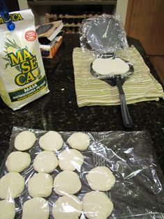 some food is laying out on the kitchen counter and ready to be cooked in the oven