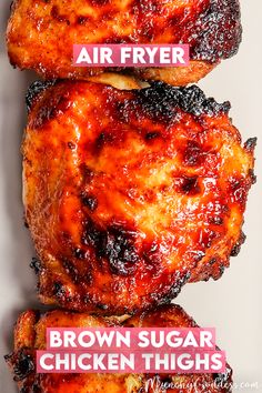 grilled chicken wings are piled on top of each other