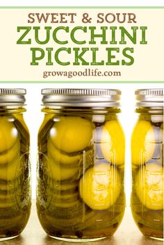 three jars filled with pickles sitting on top of a wooden table next to the words sweet and sour zucchini pickles