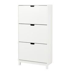 a white cabinet with three drawers on it