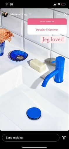 a bathroom sink with soap and toothbrushes on the counter next to it is an ad for jeg lover