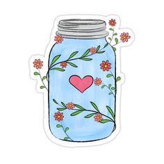 a jar filled with flowers and a heart sticker