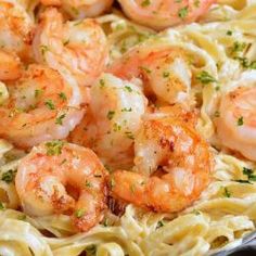 pasta with shrimp and parsley in a skillet