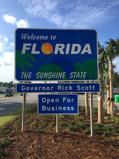 a welcome sign to florida and the sunshine state