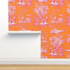 an orange and pink wallpaper with white trim