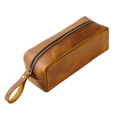 This genuine leather pen pouch is perfect for keeping stationery supplies neatly stored and organized. Crafted from top layer cowhide with a crazy horse leather finish, it's durable enough to withstand everyday use without wearing out. Enjoy a large capacity pencil case with a secure zipper closure. Product Information Material: Top Layer Cowhide Weight: 150 g Closure Type: Zipper Features: Large capacity Size: L 21* W 8* H 8 cm Leather Cases With Pen Slots For Daily Use, Portable Leather Pencil Case, Portable Leather Rectangular Pencil Case, Portable Rectangular Leather Pencil Case, Leather Pencil Case With Pen Slots For Travel, Leather Pencil Case With Pen Slots For Daily Use, Leather Pencil Case For Everyday Use, Leather Rectangular Pencil Case For Travel, Rectangular Leather Pencil Case For Travel