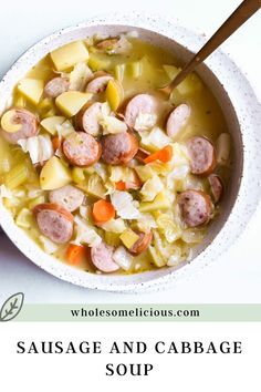 sausage and cabbage soup in a white bowl with a wooden spoon on the side text reads, sausage and cabbage soup