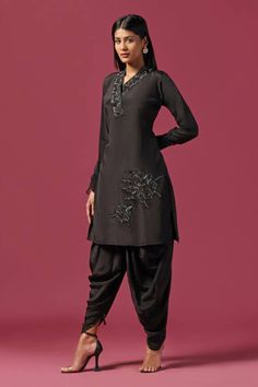 Black kurta with cutdana, sequin placement embroidery in floral pattern. Paired with dhoti pant. - Aza Fashions Fitted Pant Set With Dabka Work For Navratri, Traditional Pant Set With Self Design For Navratri, Traditional Self Design Pant Set For Navratri, Traditional Navratri Pant Set With Self Design, Black Traditional Pant Set For Festivities, Traditional Black Pant Set For Eid, Placement Embroidery, Black Kurta, Kurta Patterns