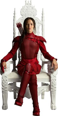 a woman sitting on top of a white chair wearing red clothes and holding a bow