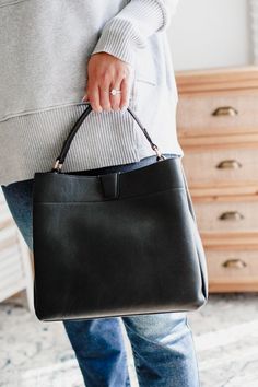 The Tati Satchel is the ultimate hobo bag for the quirky fashionista. Made of 100% vegan leather, this bag features a magnetic snap closure, zip and slip pockets, and an adjustable, detachable shoulder strap for ultimate versatility. With two spacious compartments, you'll have plenty of room for all your essentials. (Vegan leather: faux, but fabulous!) Women's vegan leather satchel with adjustable shoulder strap. Vegan leather Versatile Satchel With Detachable Handle For On-the-go, On-the-go Tote Satchel With Magnetic Closure, Adjustable Strap Hobo Shoulder Bag For On-the-go, Fall Hobo Bag With Adjustable Strap For On-the-go, On-the-go Hobo Shoulder Bag With Adjustable Strap, Versatile Shoulder Bag With Magnetic Closure For On-the-go, Detachable Strap Hobo Tote Bag For On-the-go, Modern Satchel With Magnetic Closure For On-the-go, Versatile Everyday Hobo Bag With Magnetic Closure