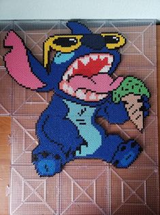 an image of a cartoon character made out of perler beads