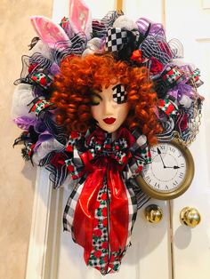 a red headed woman with long hair and makeup is hanging on the front door, next to a clock