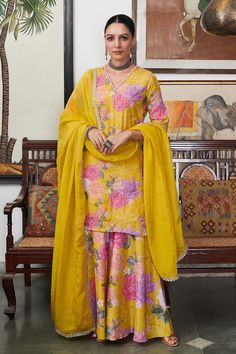 Yellow kurta with floral print and embroidery details. Paired with a printed sharara and dupatta. - Aza Fashions Silk Meenakari Sets For Eid, Yellow Meenakari Sharara For Festivals, Eid Silk Sets With Meenakari Details, Bollywood Style Yellow Sharara With Meenakari, Yellow Sets With Meenakari For Diwali, Traditional Draped Silk Sharara With Meenakari, Meenakari Silk Sharara With Traditional Drape, Silk Sharara With Meenakari For Diwali, Silk Meenakari Sharara For Diwali