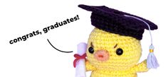 a crocheted yellow bird wearing a graduation cap and holding a diploma