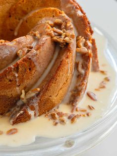 a bundt cake with nuts on top of it