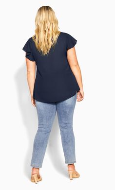 The navy Zip Fling Top is back and better than ever. With a working zip V-neckline, cute flutter sleeves and a relaxed fit style, this top is perfect for nights out on the town or completing your office outfits. Key Features Include: - V-neckline with functional zip - Short flutter sleeve - Double layer front - Relaxed fit - Hip length hemline - Lightweight woven fabrication Tuck it into a pencil skirt with some heels for work. | Plus Size Zip Fling Top in Navy, Size 16 | City Chic Casual Tops With Butterfly Sleeve For Workwear, Casual Butterfly Sleeve Tops For Workwear, Casual Workwear Top With Butterfly Sleeves, Chic Flutter Sleeve Top For Night Out, Casual Flutter Sleeve Tops For Night Out, Blue Flutter Sleeve Blouse For Work, Blue Flutter Sleeve Tops For Workwear, Blue Flutter Sleeve Tops For Work, Plus Size Workwear