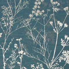 an area rug with white flowers and branches on blue background, in the foreground