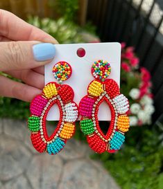 These multicoloured seed bead drop earrings have the perfect summer vibe and are the perfect accessory to add a burst of colour to your outfit.  Perfect for everyday outfits and perfect for those bright vacation outfits you have been planning. each earring weighs 6 grams Elegant, fun and fashionable hair accessories and more, shop now and own a unique statement piece that will turn heads and have everyone asking "where did you get that". Be sure to check out some of our other fun summer earrings Bead Drop Earrings, Crystal Bead Jewelry, Unique Gifts For Mom, Summer Earrings, Earrings Diy, Round Light, Beads Earrings, Beaded Drop Earrings, Summer Earring