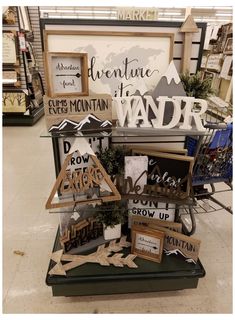 a display in a store filled with lots of signs and decorations on top of it