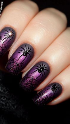 Creep into Halloween with Black Spiders on your nails, adding a touch of eerie elegance to your purple manicure. Perfect for a spooky, stylish look! Click the pin and follow us for more chilling nail designs.  #BlackSpiderNails #HalloweenNailArt #SpookyNails #NailInspiration #BoldNails Fall Nails Deep Purple, Black And Purple Sparkle Nails, Halloween Nails Short Purple, Purple And Orange Halloween Nails, Halloween Nails Dip, Purple And Black Nail Ideas, Black And Purple Halloween Nails, Purple And Black Halloween Nails, Purple Halloween Nail Designs