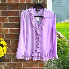 Banana Republic Ladies Xl Romantic Ruffled Purple Blouse Nwt Nwt; Never Worn. Please View All Photos, Zoom In As Necessary. ~No Visible Flaws; Brand New. A Beautiful Ladies Ruffled Purple Romantic Blouse. A Ladies Size Xl. Approx A 14/16 ~Approx 22.5” Pit To Pit & 27” In Length From Shoulder Hem To Bottom Ruffle. Somewhat Sheer, May Need A Cami Underneath. Great For A Fun Event, Date Night, Work, Etc! Any Additional Questions!? Please Ask! Purple Ruffled Blouse For Day Out, Feminine Purple Blouse With Ruffles, Purple Ruffled Blouse For Spring, Spring Purple Ruffled Blouse, Elegant Flowy Blouse With Ruffle Hem, Elegant Purple Blouse For Spring, Elegant Purple Spring Blouse, Elegant Purple Blouse With Ruffles, Purple Feminine Blouse For Brunch