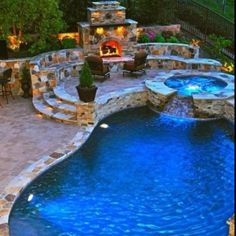 an outdoor swimming pool surrounded by patio furniture and landscaping features is shown in this screenshot