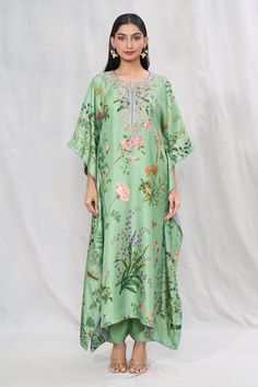 Light green kaftan with multi colored floral prints and embroidered yoke. Comes with solid pant. - Aza Fashions Spring Green Kaftan With Printed Motifs, Green Silk Tunic Kaftan, Green Floral Print Maxi Set, Green Floral Print Maxi Length Set, Green Silk Kurta With Floral Print, Green Silk Kurta With Embroidered Border, Spring Anarkali Kaftan With Floral Print, Spring Silk Kaftan With Printed Motifs, Green Embroidered Maxi Sets