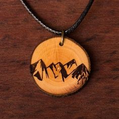 Sustainability as well as the use of non-animal (vegan) products, are important to us. That is why we use cotton instead of leather cords and high-quality coconut oil or, in the case of pine products, pine oil for sealing the wood instead of chemicals. All of our Pendants are cut remnants from the forest, sections of fruit trees or driftwood from Tyrolean rivers. Because of our jewelry, no tree was felled or harmed! ATTENTION! Each piece of jewelery is unique in form and color! The engraving of Adjustable Natural Wood Necklace Nature-inspired, Natural Waxed Cord Necklace As Gift, Natural Waxed Cord Necklace For Gift, Rustic Natural Wood Necklace, Pine Oil, Vegan Products, Wood Necklace, Fruit Trees, The Forest