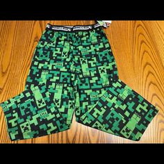 Perfect For Minecraft Fans! These Flame Resistant, Lightweight Pajama Pants For Boys Feature An All-Over Print With The Iconic Minecraft Creeper And Tnt In A Pixelated Pattern. Perfect Comfortable Clothes For Relaxing And Playing His Favorite Game! Elastic Waist, Pull On Styling. Green Long Pants For Bedtime, Minecraft Clothes, Minecraft Outfits, Toddler Girls Leggings, Pants For Boys, Wishlist Ideas, Camo Jeans, Toddler Jeans, Kids Jogger