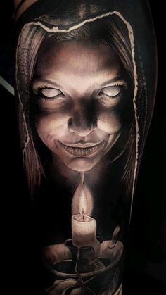 an image of a woman with a candle in her hand