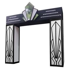 a black and white arch with mirrors on it's sides in the shape of art deco