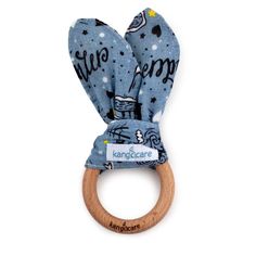 a wooden ring with blue fabric and stars on it