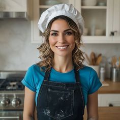 a woman wearing an apron and chef's hat