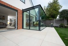 an open patio area with sliding glass doors