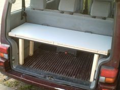 the back end of a van with its cargo compartment open