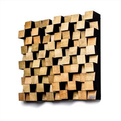 a piece of wood that has been cut into squares and placed on top of each other