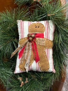 a christmas ornament with a gingerbread on it