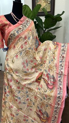 Satin crepe pure gajji  silk saree with prestitched blouse Kalamkari prints.. blouse -36 goes up to 42 inches   With embroidered gotta borders.   DETAILS AND CARE Color : satin crepe gajji silk printed sarees  Weight : 600 - 800 grams Length : 5.5 m saree + 0.7 m blouse  Width : 48 Inches Fabric :satin  Craft Description :  Wash Care : Dry Wash Only Shipping Time : 5 - 7 Working days We Ship Worldwide SHIPPING AND RETURNS Shipping Policy : Shipping days as mentioned above, subject to changes based on the government regulations around the prevailing pandemic situation.  Return Policy :   We have a comprehensive returns policy , kindly refer to our policy section to know more . DISCLAIMER Colour : There can be a slight variance in the colours of the products on our site from the actual ones. Pink Pre-draped Saree With Printed Motifs For Festivals, Bohemian Multicolor Pre-draped Saree With Unstitched Blouse, Semi-stitched Silk Pre-draped Saree With Printed Motifs, Pink Bohemian Pre-draped Saree For Festivals, Festival Art Silk Pre-draped Saree With Printed Motifs, Bohemian Multicolor Block Print Pre-draped Saree, Multicolor Cotton Silk Pre-draped Saree With Printed Motifs, Silk Pre-draped Saree With Printed Motifs, Bohemian Pre-draped Saree With Printed Motifs For Festivals