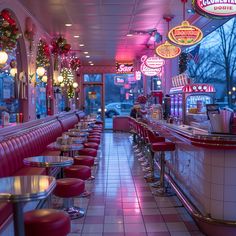 a diner with red chairs and neon lights on the ceiling, along with christmas decorations