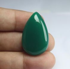 Name Of The Stone = Natural  green onyx gemstone Code Of The Stone = 4016 Weight Of The Stone= 35ct Size = 31 X 20 X 7mm shape = oval Green Onyx is associated with the planet Mercury, which is known to represent intelligence, elevated brain power, and enhanced memory. It is meant for anyone who wants to speak truth from the heart. This mineral opens up and actives the heart, in alignment to the brain, producing honesty and powerful realizations. Payment; We Accept Payment Though PayPal only . RE Luxury Oval Green Onyx Jewelry, Planet Mercury, Speak Truth, Brain Power, Jewellery Handmade, Onyx Gemstone, Speak The Truth, Green Onyx, Loose Gemstones