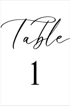 the table number 1 is black and white with calligraphy on it's side